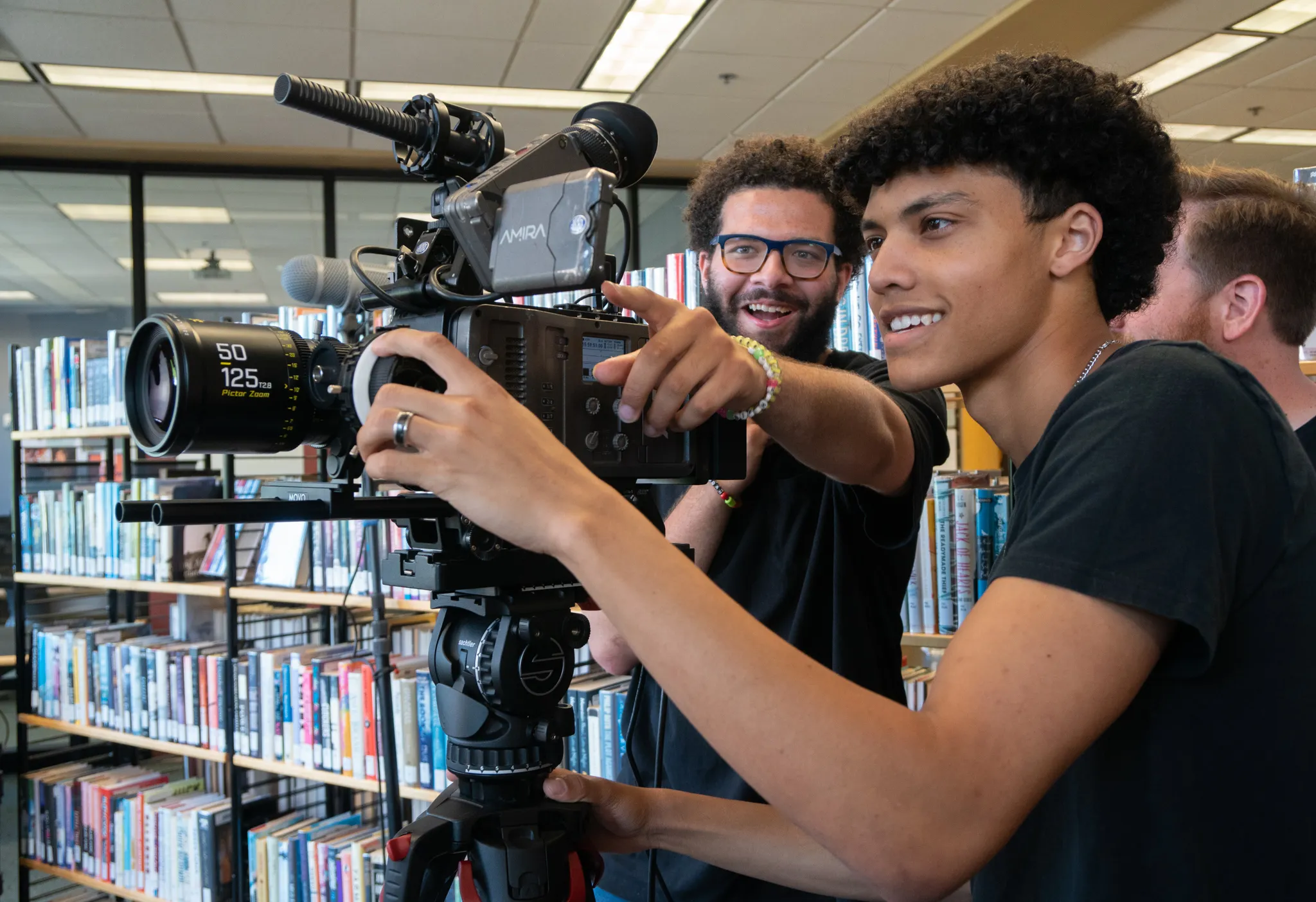 Students operating camera